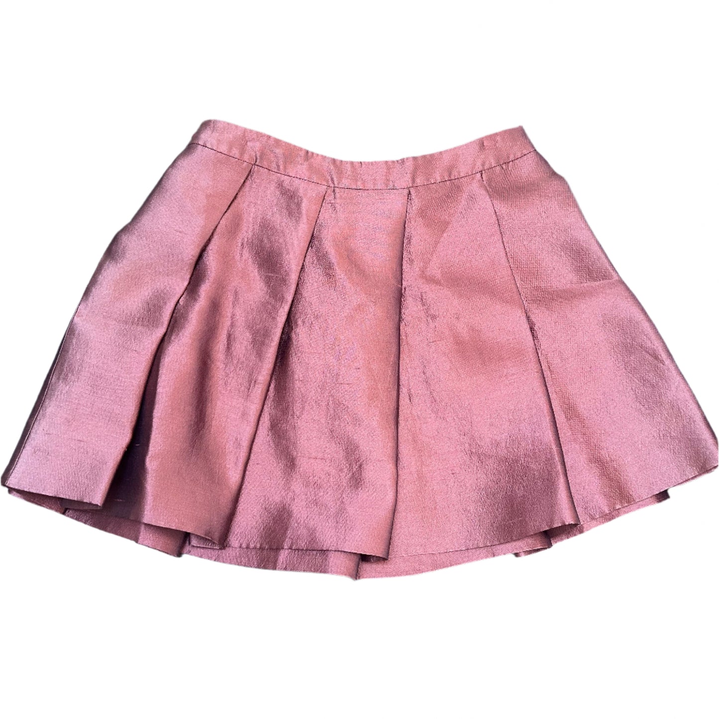 Back View of a Miu Miu mini skirt in a metallic burgundy fabric with a structured silhouette. The skirt features sharp pleats for added volume and a clean waistband design