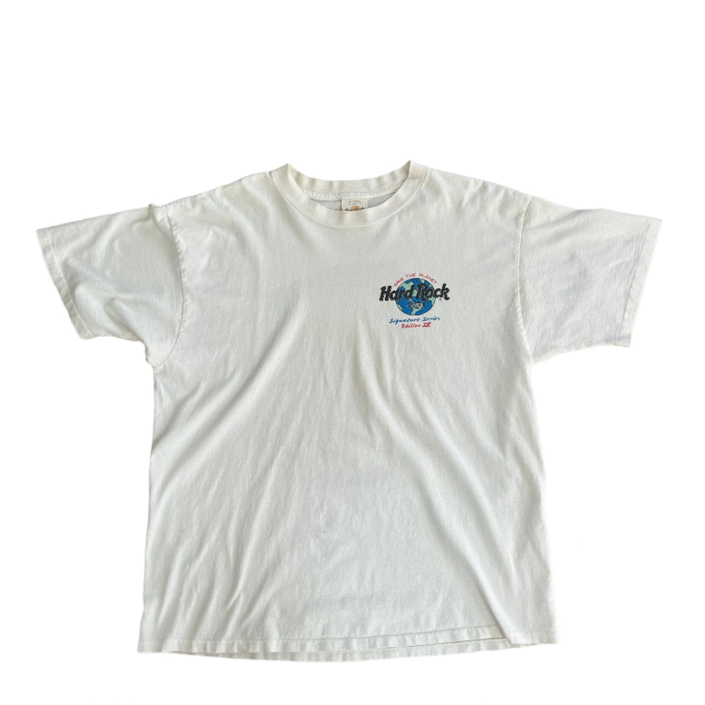 Front view of a 1994 Hard Rock Cafe Don Henley The Eagles Signature Series T-Shirt in white, featuring the Hard Rock logo and 'Signature Series Edition XI' text. A collectible piece celebrating music history and The Eagles' legacy.