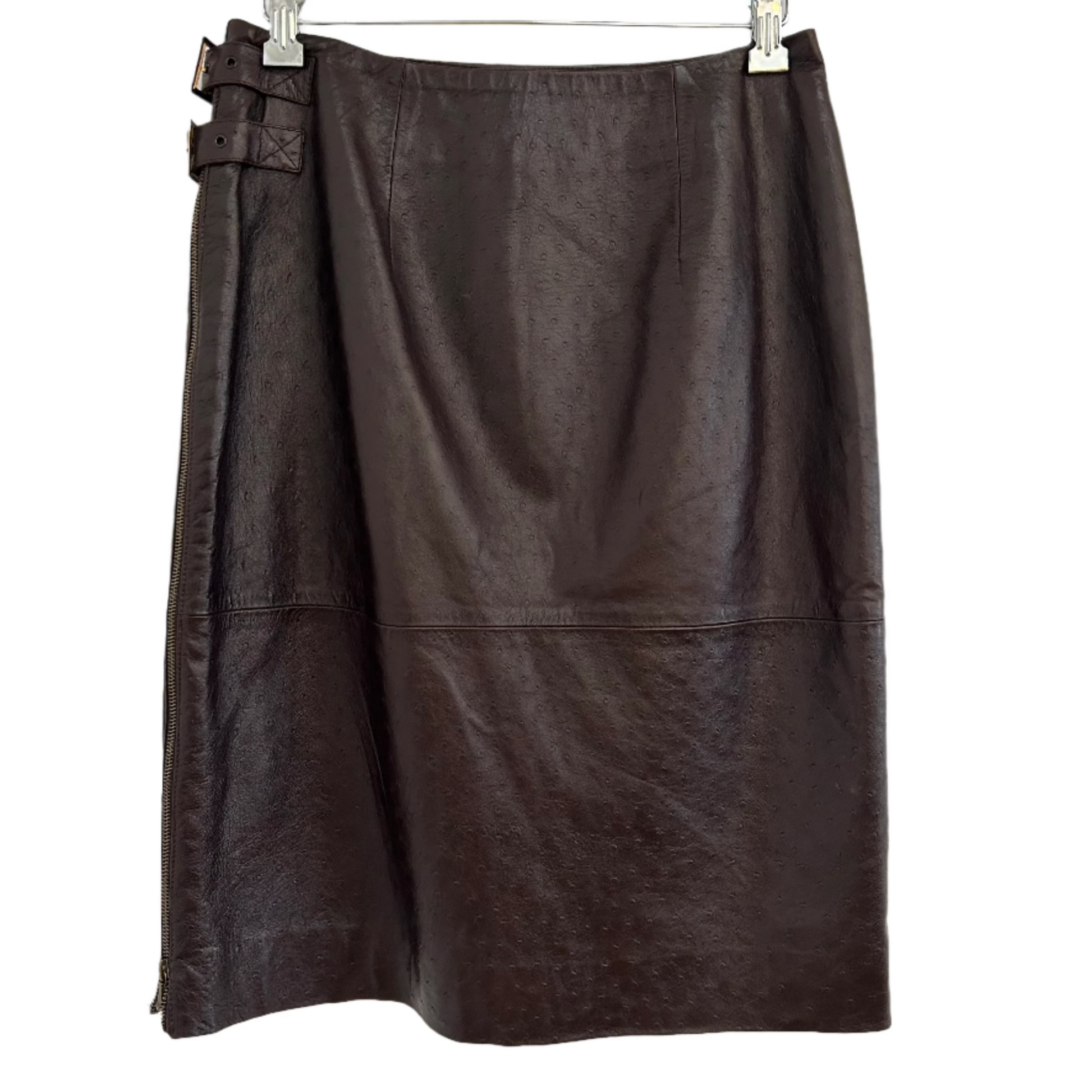 Back view of a 1990s John Galliano for Christian Dior lambskin skirt in dark brown, showcasing its smooth leather texture and signature belt detailing. A luxurious piece of vintage haute couture.