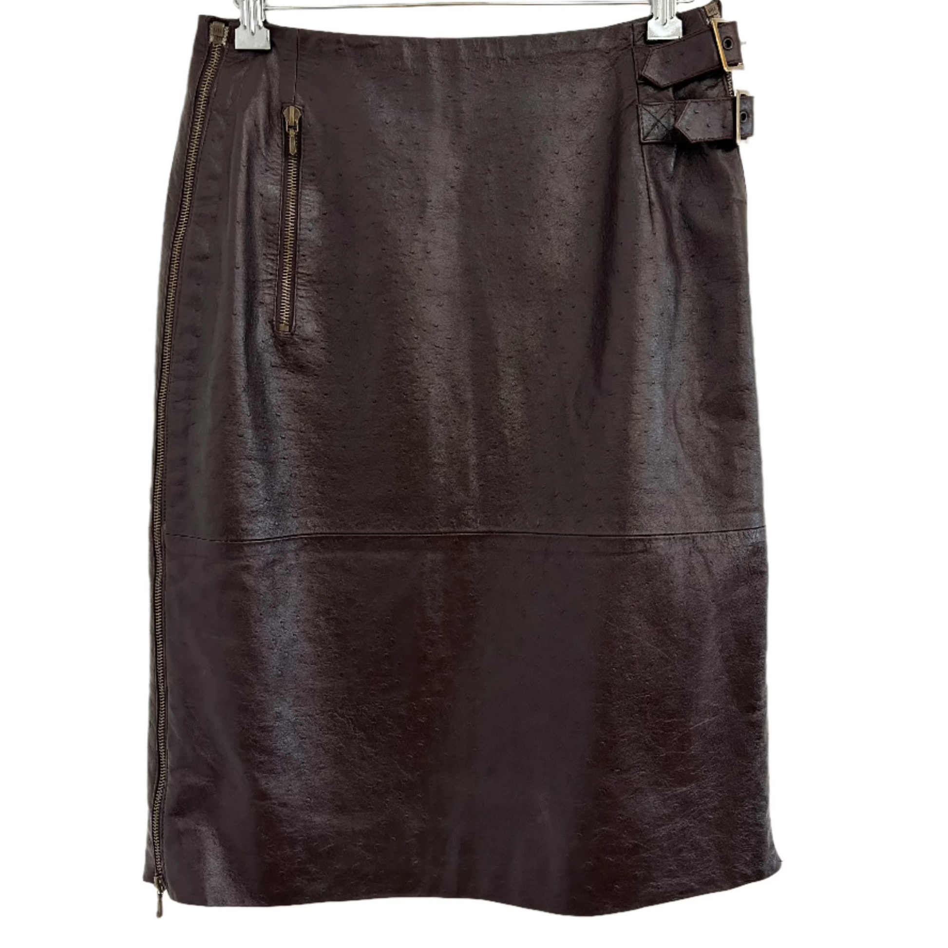 Front view of a 1990s John Galliano for Christian Dior lambskin skirt in dark brown, featuring textured leather, side zipper details, and signature belt accents. A rare collectible piece of high-fashion history.