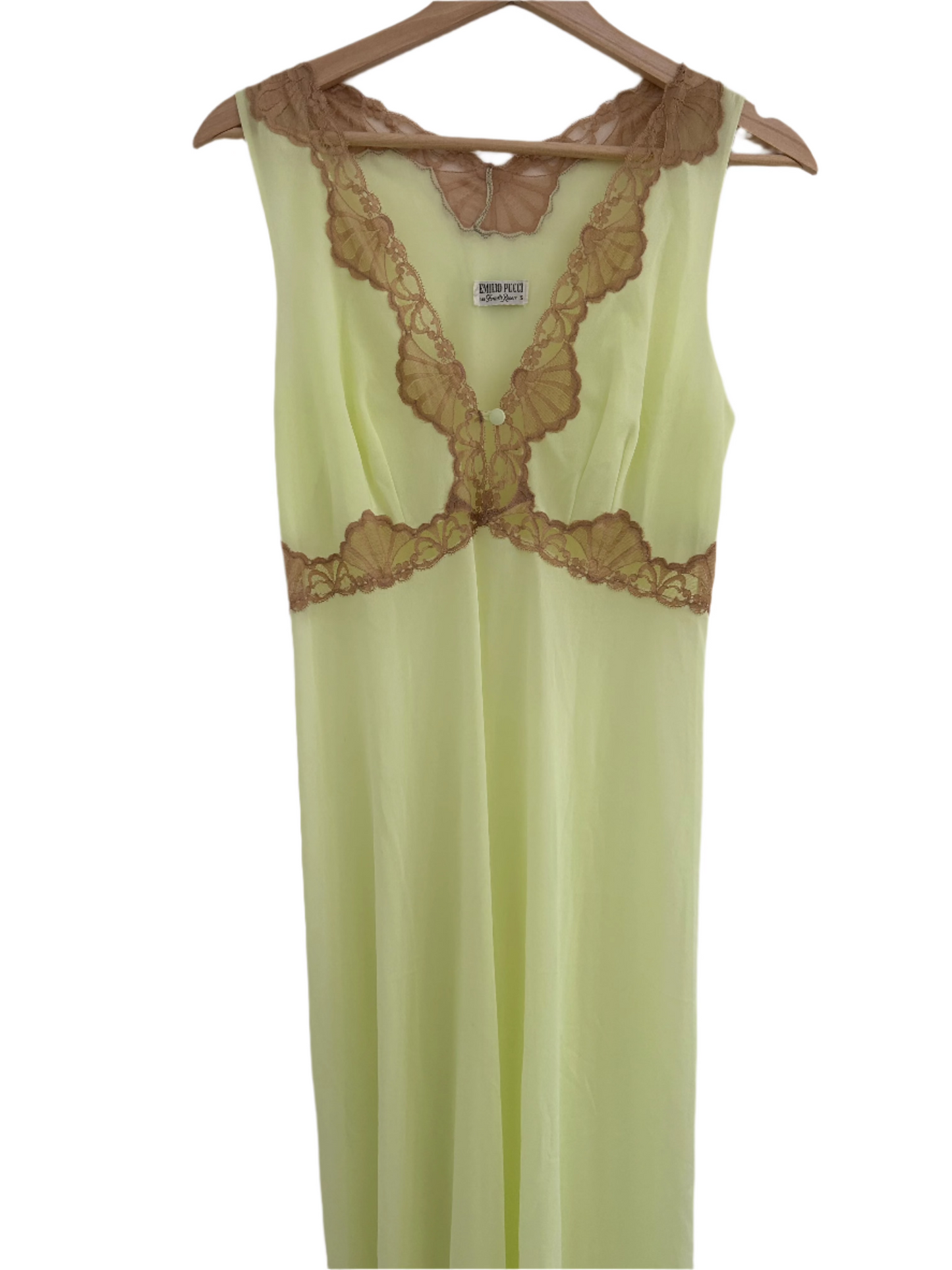 Front view of a 1960s Emilio Pucci sheer slip in pale green, highlighted by exquisite lace detailing on the neckline and waist. A vintage fashion treasure that celebrates timeless elegance and sustainable luxury.