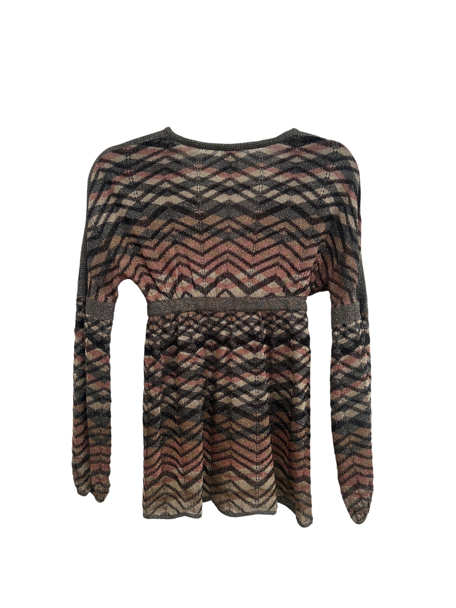 A vintage Missoni 1990s balloon sleeve top displayed from the back. The garment features a signature zigzag knit pattern in earthy tones of black, brown, beige, and muted pink. The fabric has a metallic sheen, and the top includes a cinched waistline with a horizontal band. The long balloon sleeves taper slightly at the cuffs, and the hemline falls loosely, creating a relaxed silhouette.