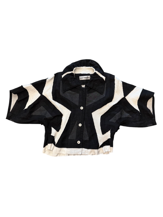 Black and white geometric patterned jacket on a white background