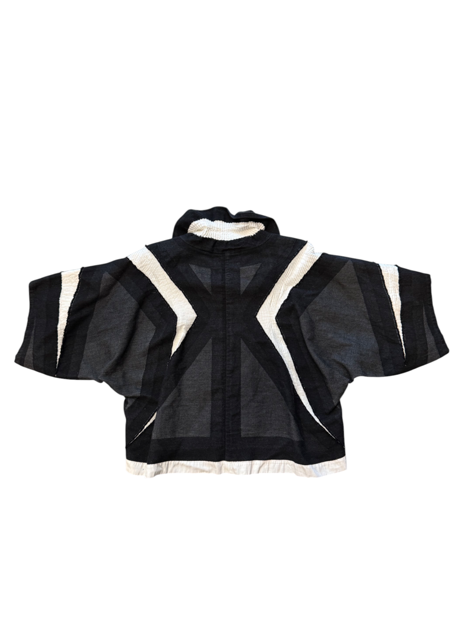 Black and white jacket with geometric design on a white background