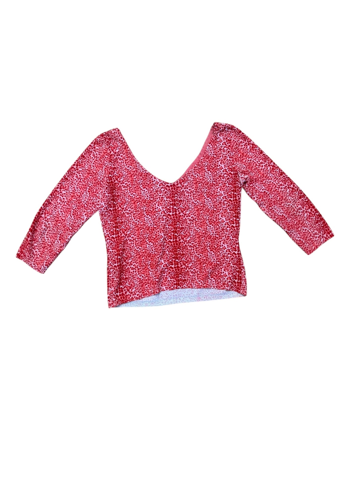 Red and white patterned fabric on a white background