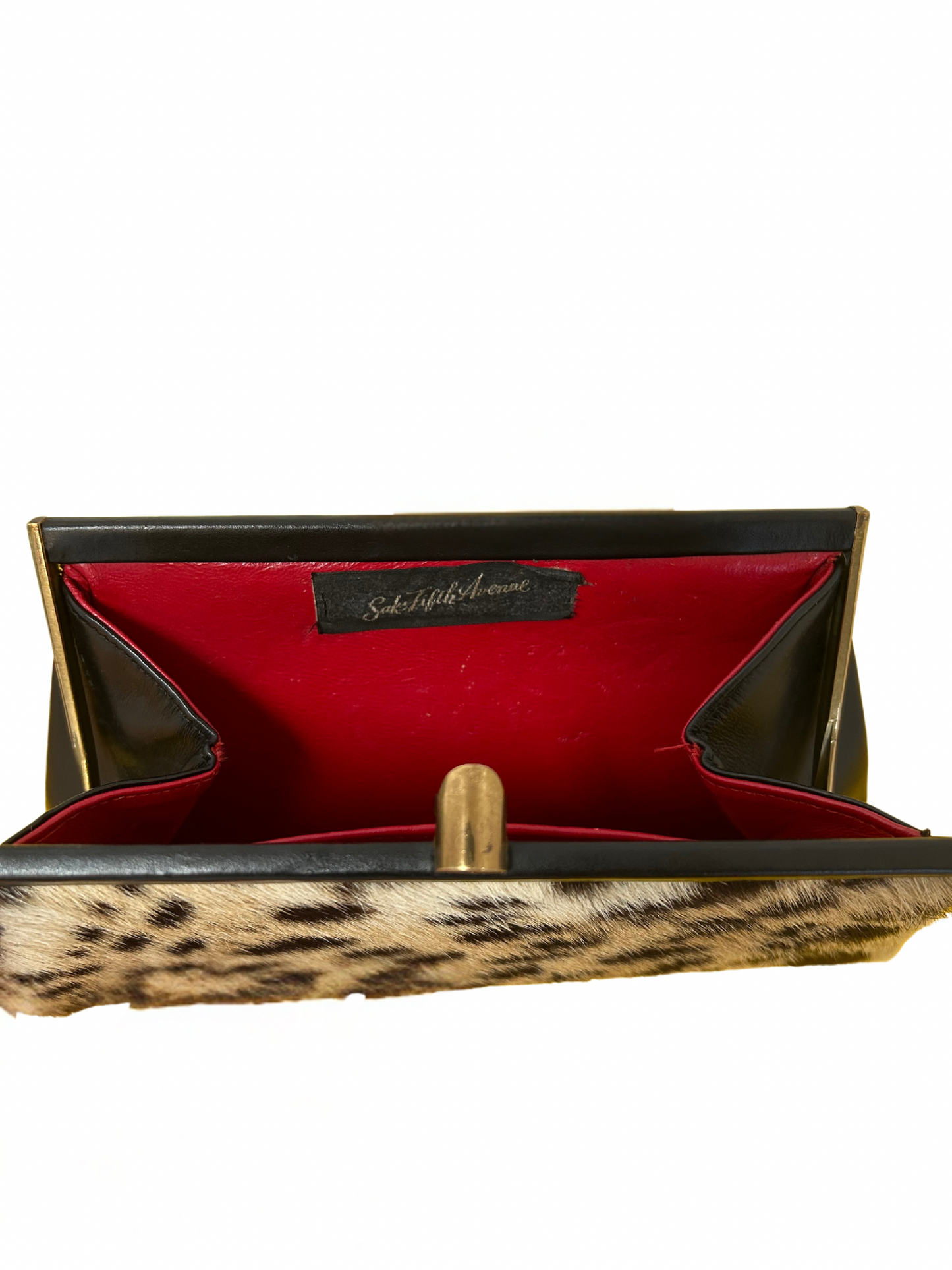Photo of the inside of the Saks 5th Avenue Clutch with one internal pocket. It is in amazing beautiful condition. 