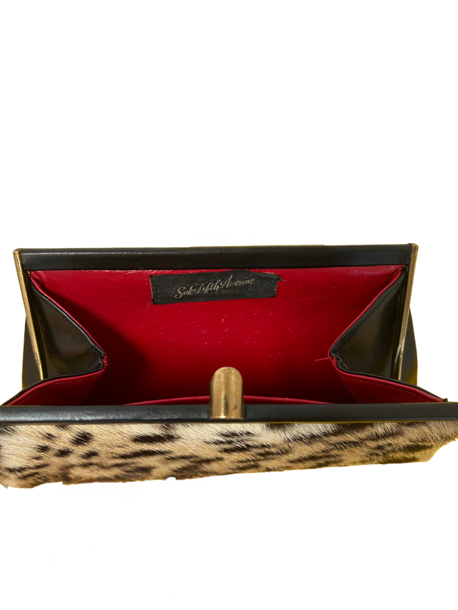 Photo of the inside of the Saks 5th Avenue Clutch with one internal pocket. It is in amazing beautiful condition. 
