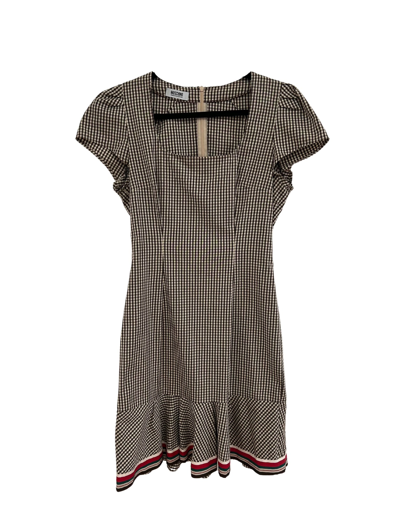 Front Product photo of an adorable A-line Moschino Cheap and Chic dress. Brown and White Gingham with a bottom embellishment of red white and navy ships. 