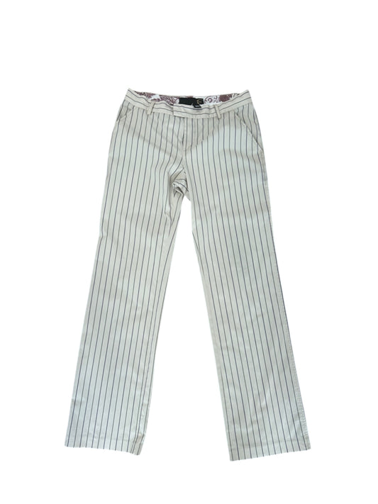  A pair of Just Cavalli cream striped wide-leg pants laid flat against a white background. The pants feature thin vertical black stripes, a structured waistband with belt loops, a zip and hidden clasp front closure, and fold-over back pockets. The interior waistband has a patterned fabric lining, visible at the top. The fabric appears slightly worn with minor signs of use on the pockets. The trousers have a classic nautical-inspired design with a relaxed yet tailored fit.
